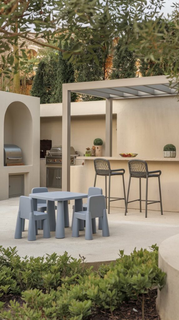 A family friendly outdoor kitchen setup with a place for kids to sit and eat and a separate counter for adults.