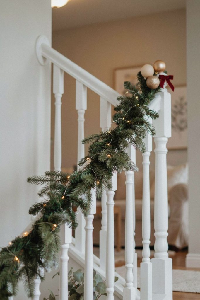 drape garlands along the stairs and mantel