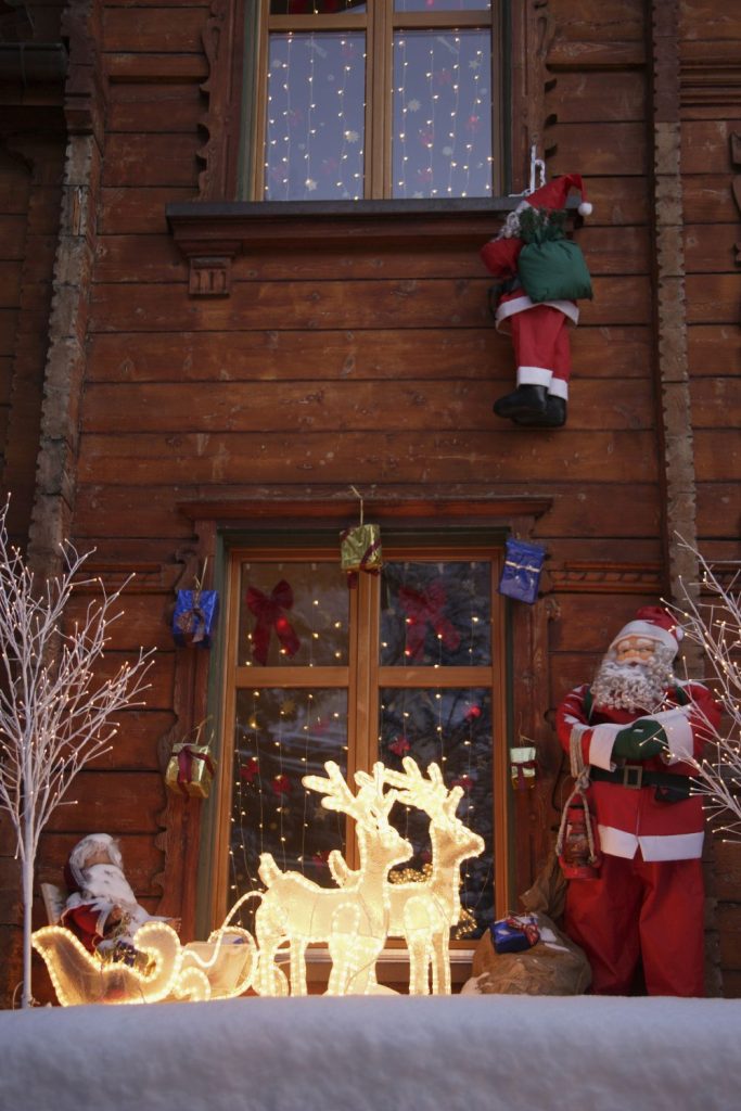 tie your outdoor christmas decor ideas together in one yard display